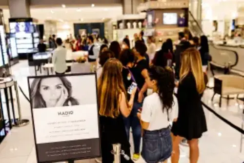 Here we can see a group of people waiting in the line on a product launch event that we hosted.